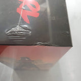 A close-up of a shrink-wrapped Final Girl: S3 Ultimate Box (Damaged) by Van Ryder Games, showing a dented corner. The black top features red text and the side displays dark red Series 3 artwork. The box rests on a light surface.