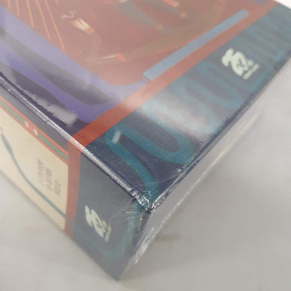 A close-up of a shrink-wrapped Ra (25th Century Games English retail edition 2023) box shows colorful abstract designs and the 25th Century Games logo on two sides of this renowned Ancient Egyptian auction game. Box is damaged.