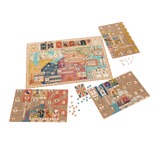 The Devir 3 Ring Circus board game is shown with its main illustrated board, four player boards, assorted cards, and red, blue, yellow, and white tokens arranged on a white background.