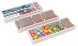 The Folded Space - Daitoshi Insert by Folded Space neatly organizes colorful board game pieces—blue, yellow, pink, and green animal tokens—plus cards and cardboard tokens, making it ideal for any board game organizer setup.