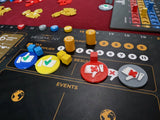 A close-up of Game Maker Team's Hegemony - 3D Upgraded Components shows vibrant tokens and markers on a black board with tax, events, and results sections featuring thumbs up/down icons. Additional 3D components are visible in the background.