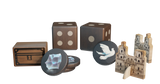 A set of Pax Hispanica board game pieces by Ion Game Design includes two wooden dice, hidden role tokens with gems and a white dove, plus a small arched wooden building, displayed on a white background.