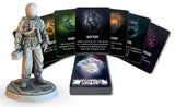 A gray astronaut figurine stands beside fanned-out Artifact cards from S.T.A.L.K.E.R. The Board Game by Awaken Realms, each card featuring unique artwork and abilities like Bubble, Battery, and Gold Heart.