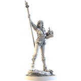 This detailed 3D-printed miniature from Go On Board’s The Witcher: Path of Destiny Triss & A Grain of Truth Expansion depicts a fantasy mage in ornate armor, casting fiery magic with her staff, standing atop a rocky base.