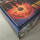 A close-up of a Fantasy Flight Games Twilight Imperium: Fourth Edition Thunder's Edge Expansion (Damaged) box corner, showing a small dent and vibrant artwork featuring fiery designs and sci-fi characters.
