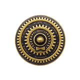 The Eagle-Gryphon Games Weather Machine: Metal Nobel Prize pin features a round gold and black design with gear-like patterns, a central raised circle, laurel leaves on each side, and a small bowtie below, shown on a light gray background.