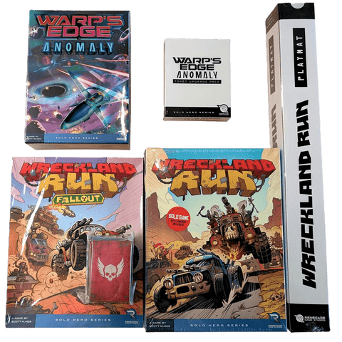 A set of board game items from Renegade Game Studios, featuring the Wreckland Run (Kickstarter Wreck & Roll Pledge), Warp's Edge Anomaly, a card deck, playmat tube, and a small metal box with a skull logo.