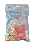 A sealed plastic bag labeled Wyrmspan Bundle by Stonemaier Games contains gold, red, and clear game pieces plus small baggies for the dragon sanctuary game. The label and contents are visible through the packaging.