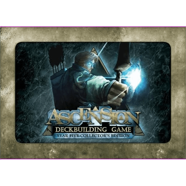 A cloaked figure with a glowing blue crystal is featured on Stone Blade Entertainment’s Ascension: Year Five Collector’s Edition, shown with premium foil cards on a stone-textured background and content from the Dreamscape expansion.