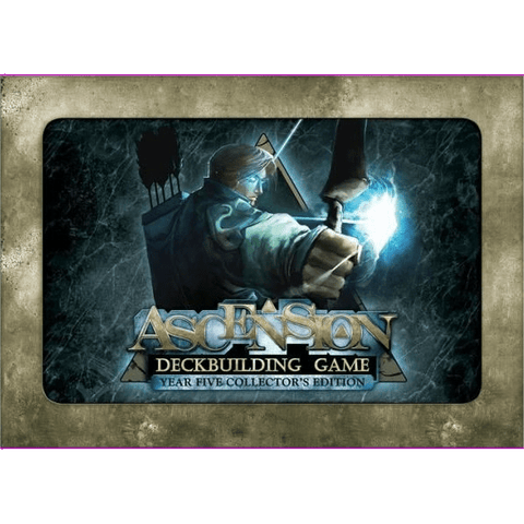 A cloaked figure with a glowing blue crystal is featured on Stone Blade Entertainment’s Ascension: Year Five Collector’s Edition, shown with premium foil cards on a stone-textured background and content from the Dreamscape expansion.