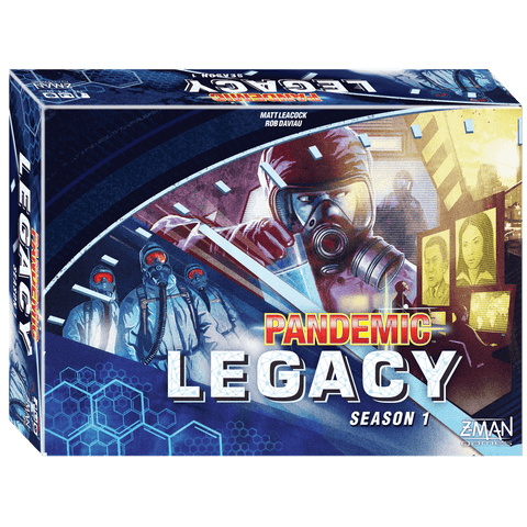 Box cover of Z-Man Games’ Pandemic Legacy: Season 1 (Blue), showing figures in hazmat suits and a gas mask, with red virus symbols and blue scientific graphics in the background.